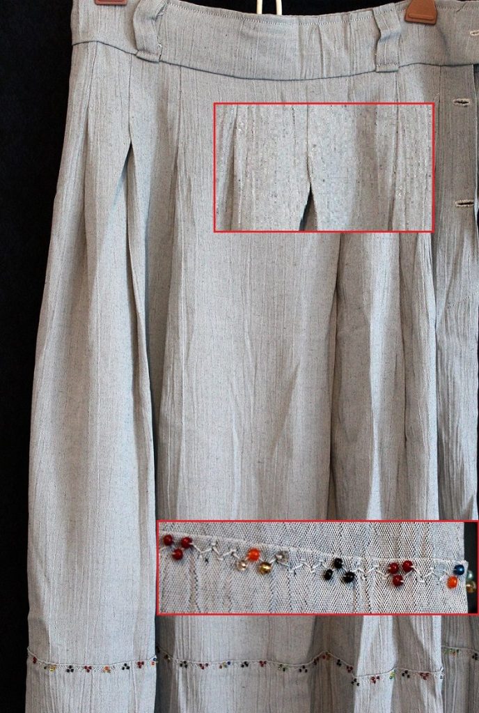 Beaded embroidery on skirt topstitch